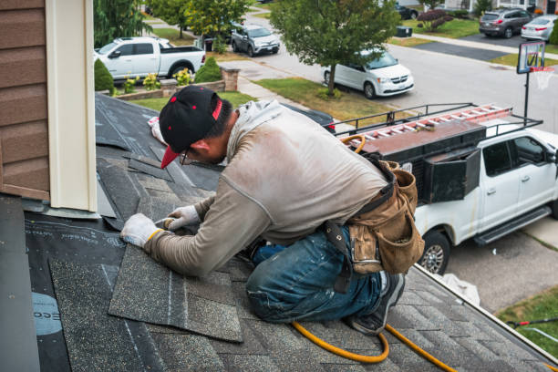 Professional Flat Roof Repair technician working in North Chelmsford, MA